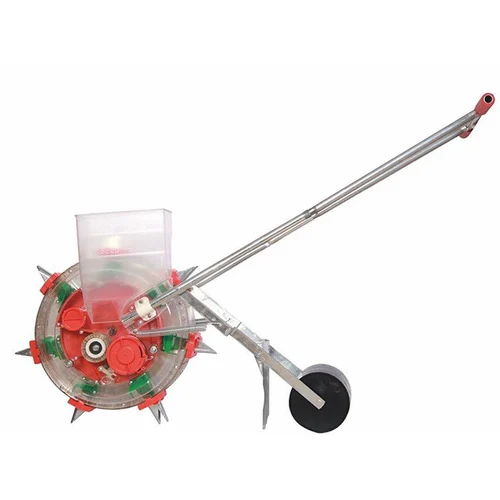 A manual push seeder machine used for planting crops in small farms and gardens.