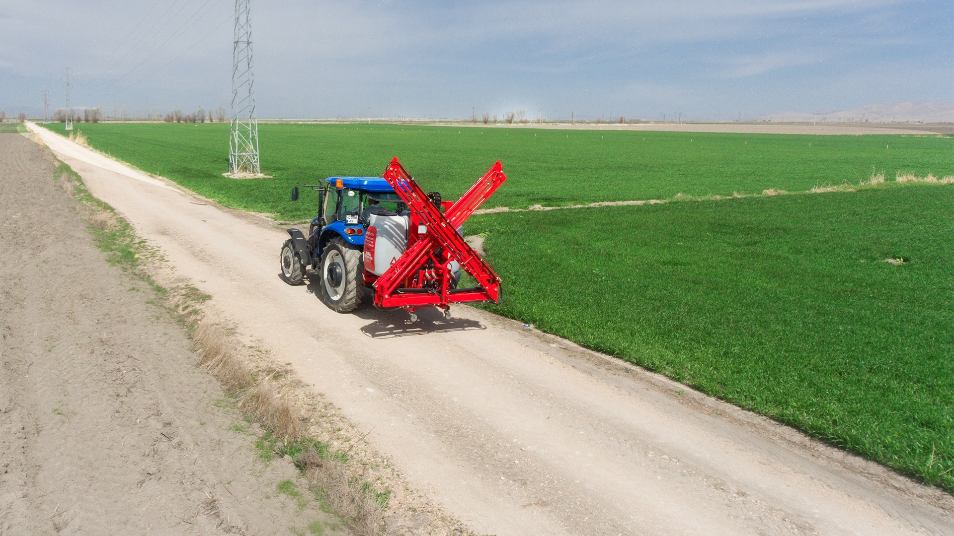 Tractor trailed boom sprayer