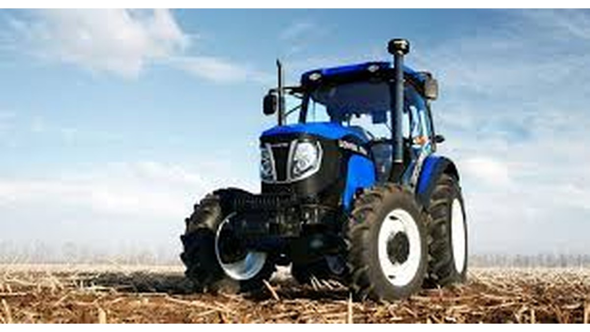Lovol TD1104 tractor showing the exterior design, large agricultural tyres and enclosed operator cabin