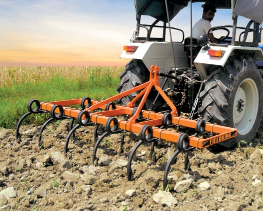 Modern Powertiller ploughing at a field.